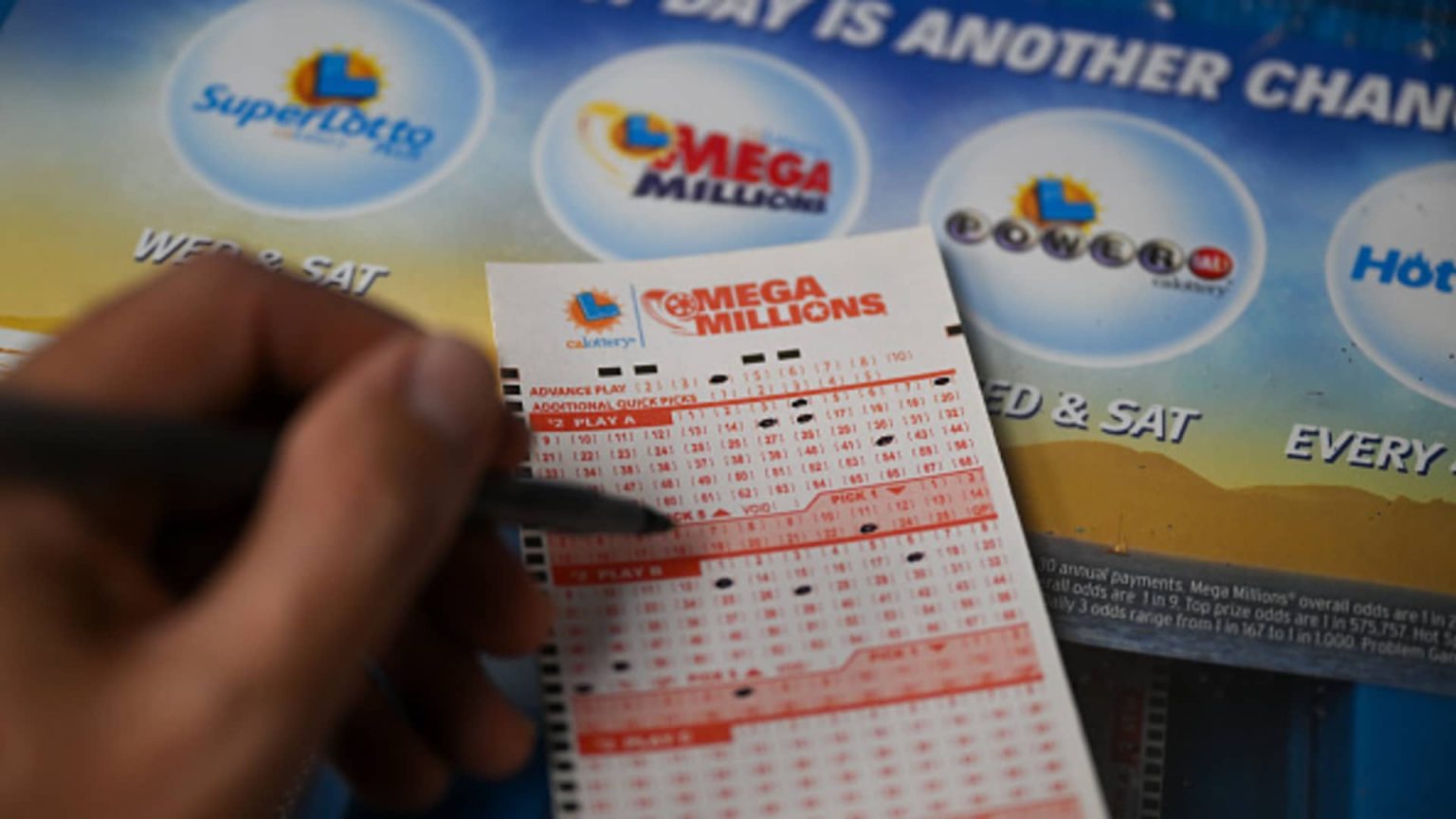 Mega Millions jackpot hits $910 million. Here’s the tax bill if you win