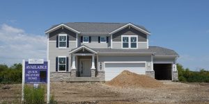Sales of newly built homes lose some momentum in June
