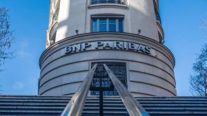 BNP Paribas earnings boost clipped by charges