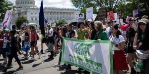 Jobs at companies paying for abortion-related travel receive a spike in interest — but also face a backlash