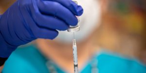 New Covid Strain Arrives as Vaccine Makers Gear Up