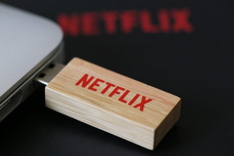 Netflix raises prices and adds subscribers, despite strikes