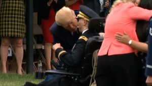 Hear what Trump reportedly said about injured veteran after this hug
