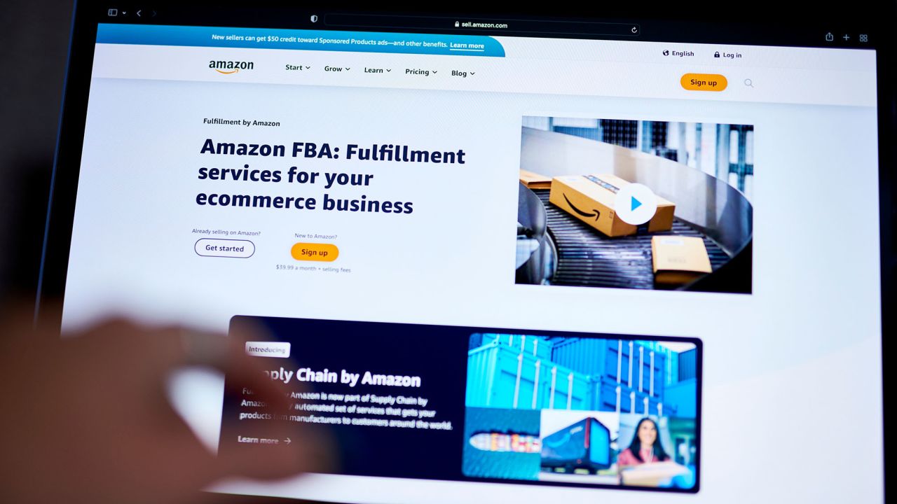 The Amazon.com website is seen on a laptop in New York in September. The US Federal Trade Commission sued Amazon.com Inc. in a long-anticipated antitrust case, accusing the e-commerce giant of monopolizing online marketplace services by degrading quality for shoppers and overcharging sellers.