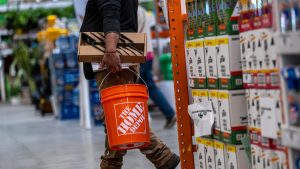 Home Depot earnings beat, but retailer offers a tepid outlook as sales slide